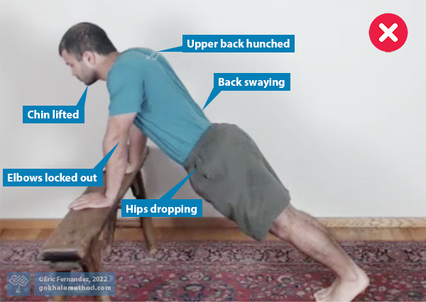Gokhale Method teacher Eric Fernandez demonstrates a push-up with poor form.